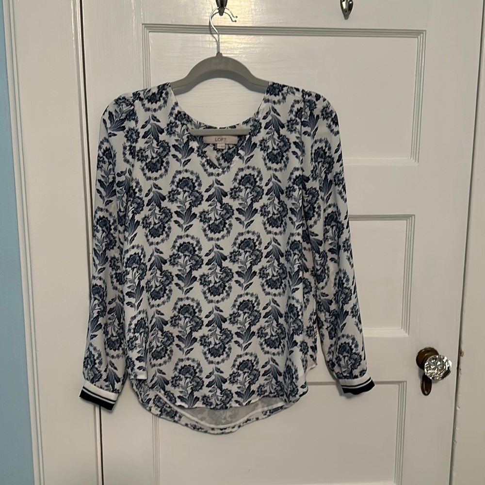 Blue floral long sleeve blouse with v neck in size xs